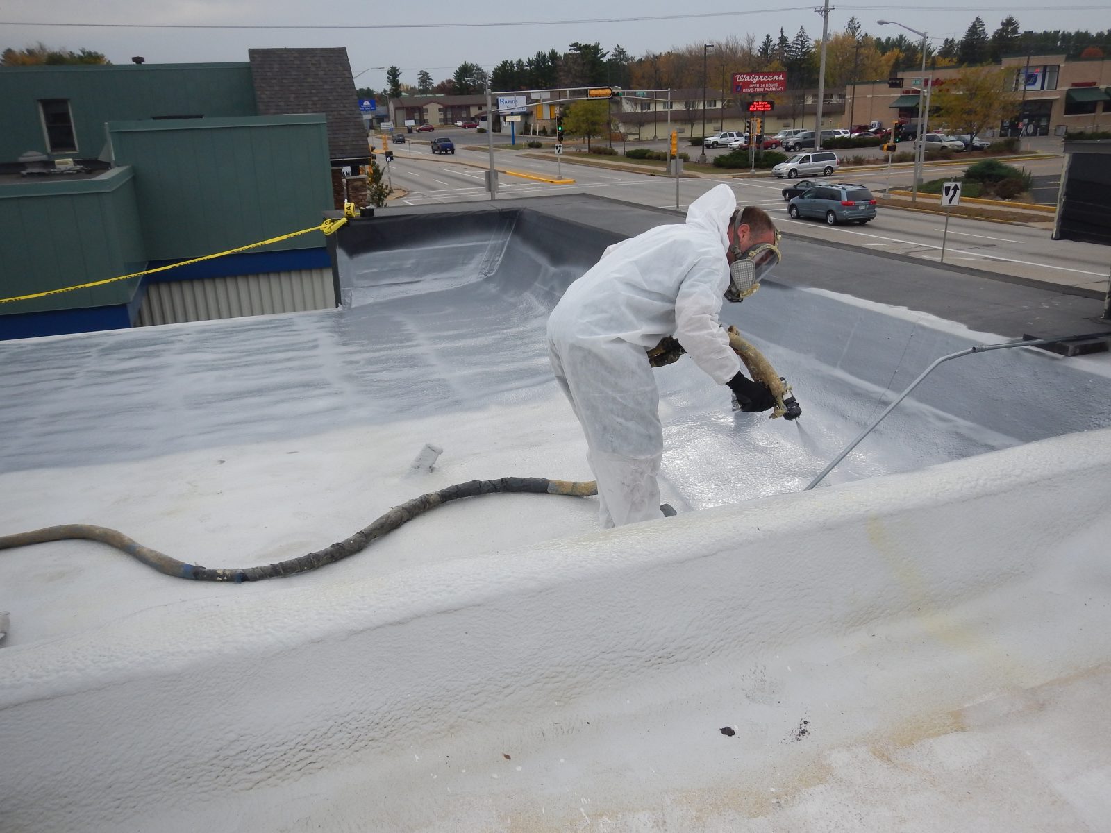 Seamless polyurea roof membrane wrapping roof details